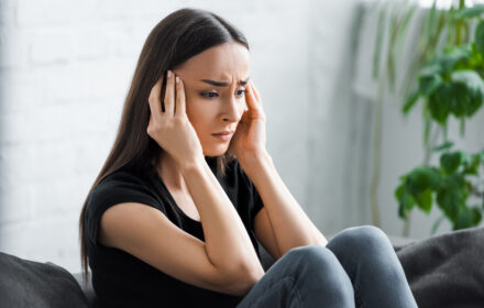 woman showing signs of stress